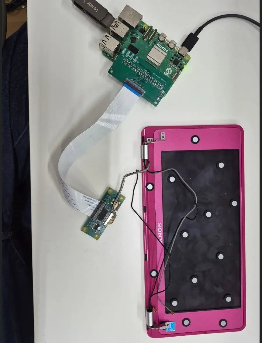 VAIO P lid wired to a Raspberry Pi through the custom LCD board