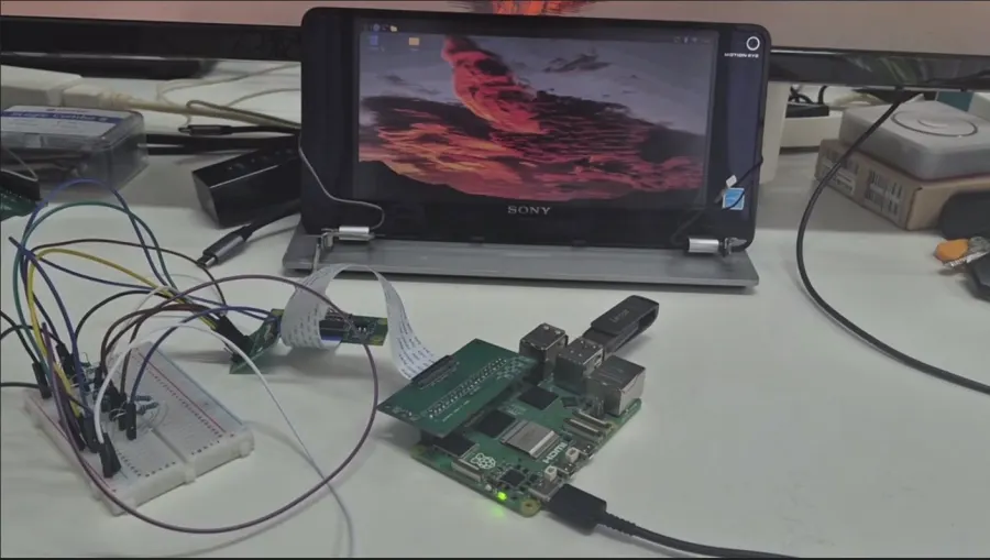 The VAIO P screen showing a desktop, driven from a Raspberry Pi on the bench